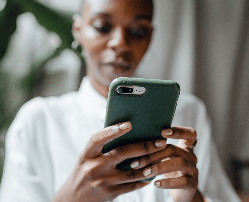 black woman on cell phone requesting more information