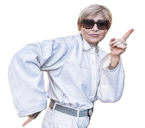 Market President, Lorna Short with sunglasses on, pointing finger.