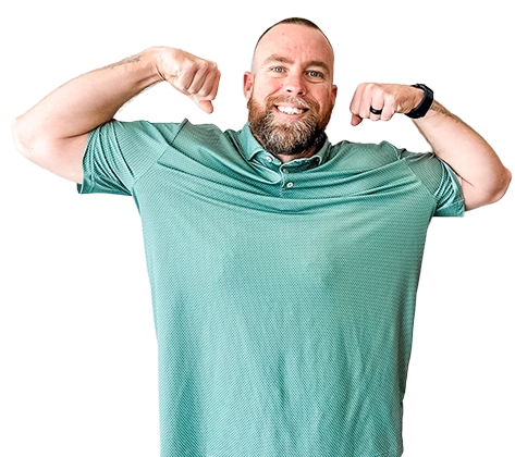 Rich Elsner, Riverview Market President, flexing muscles with a smile.