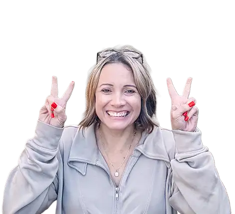 Christine Lopez, Highlands County Market President, smiling with hands posed in peace symbols.